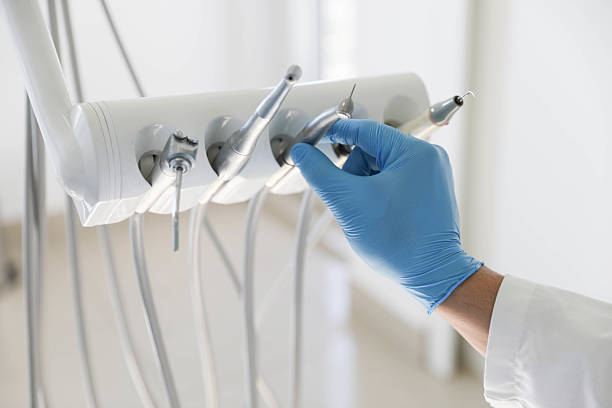 Professional Invisalign Clear Aligners technician working in Oak Ridge, FL